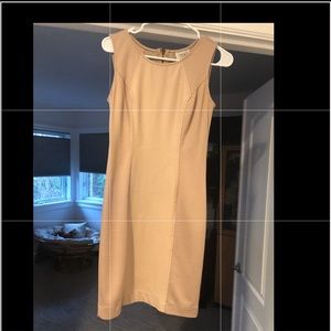 Nude sleeveless dress with faux leather